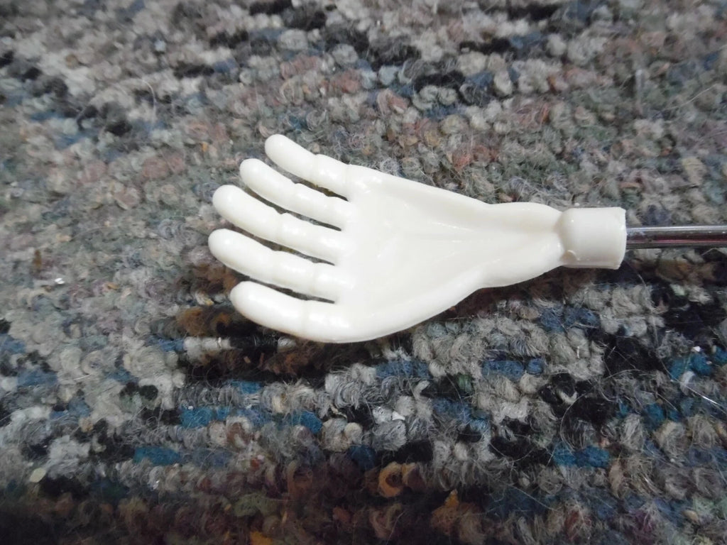 Vintage plastic battery operated back scratcher