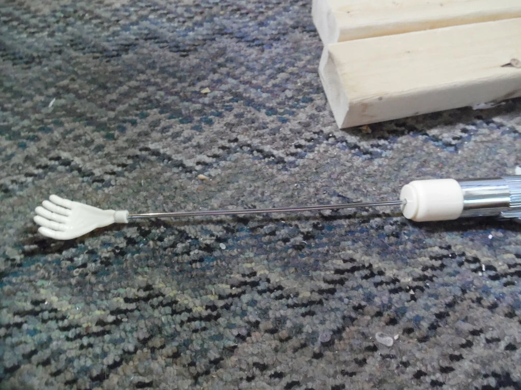 Vintage plastic battery operated back scratcher